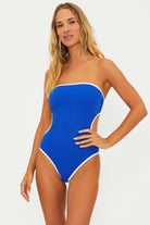 One piece with removable straps and side cutouts in blue with white blocking