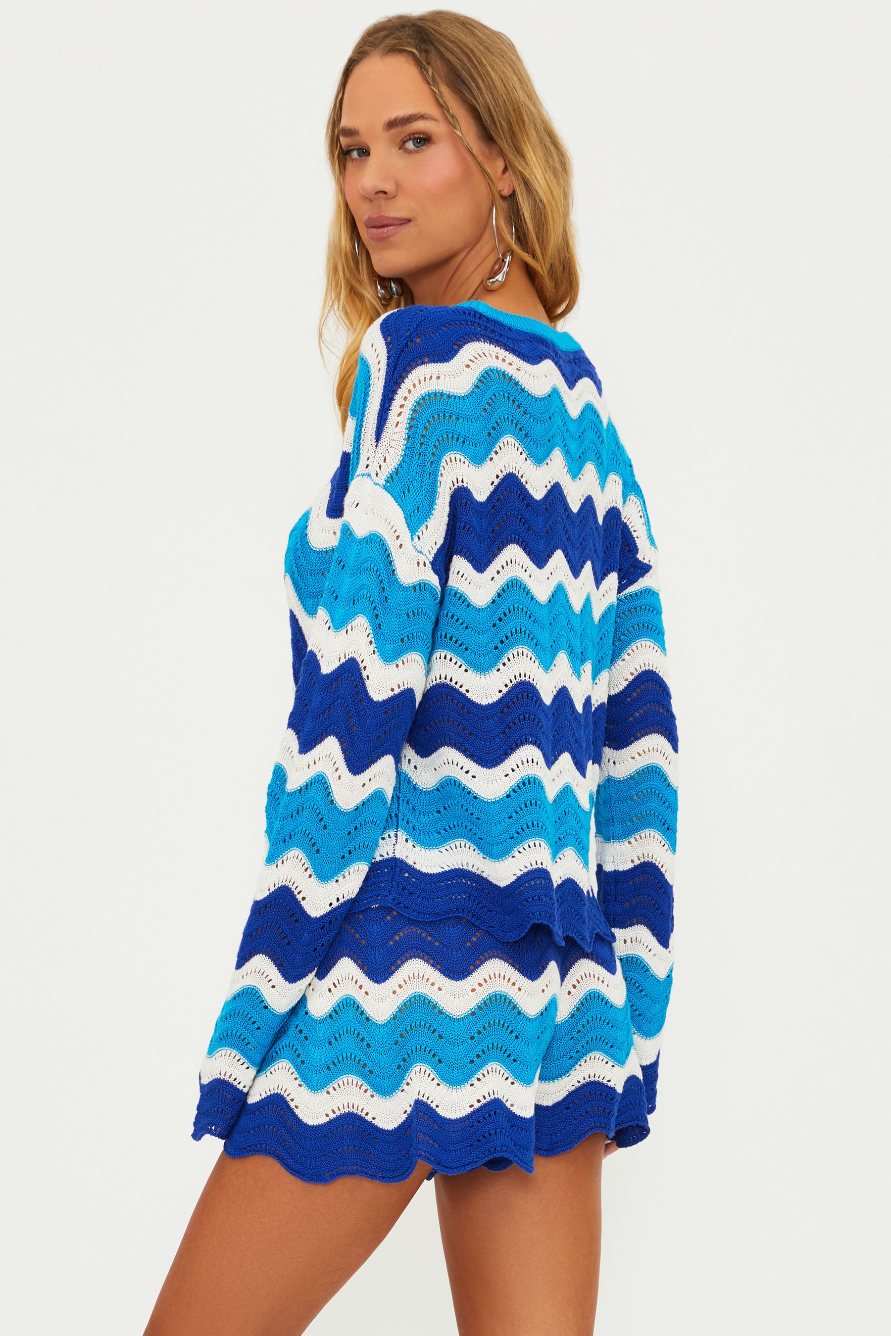 Open knit sweater with colorful wavy stripes