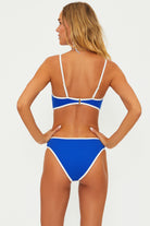 One piece with removable straps and side cutouts in blue with white blocking