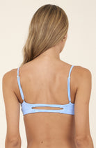 Scooped neck top with adjustable straps in light blue with palm tree print