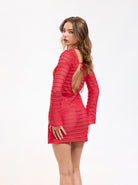 Mesh coverup mini dress with a high neck, open back, and long sleeves in red