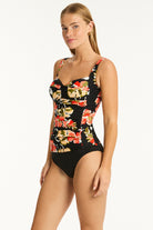 Twist front tankini top with padded cup support in multicolor print