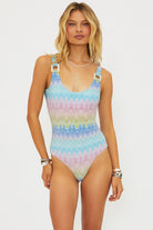 Shimmery scoop neck one piece with square shaped ivory hardware in multicolor pastel print