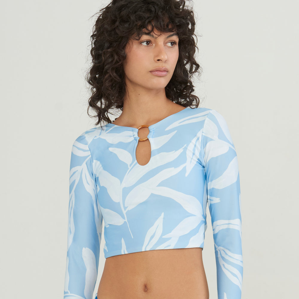 
                  
                    blue and white long sleeve swimsuit crop top 
                  
                