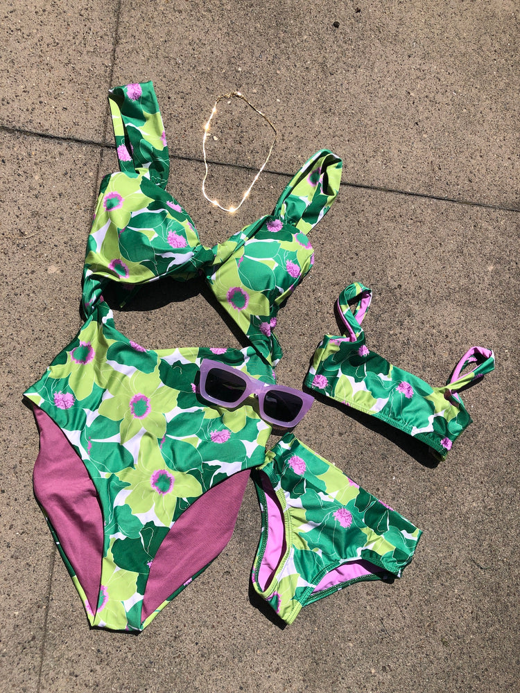 
                  
                    green printed floral matching mother and daughter swimsuits
                  
                