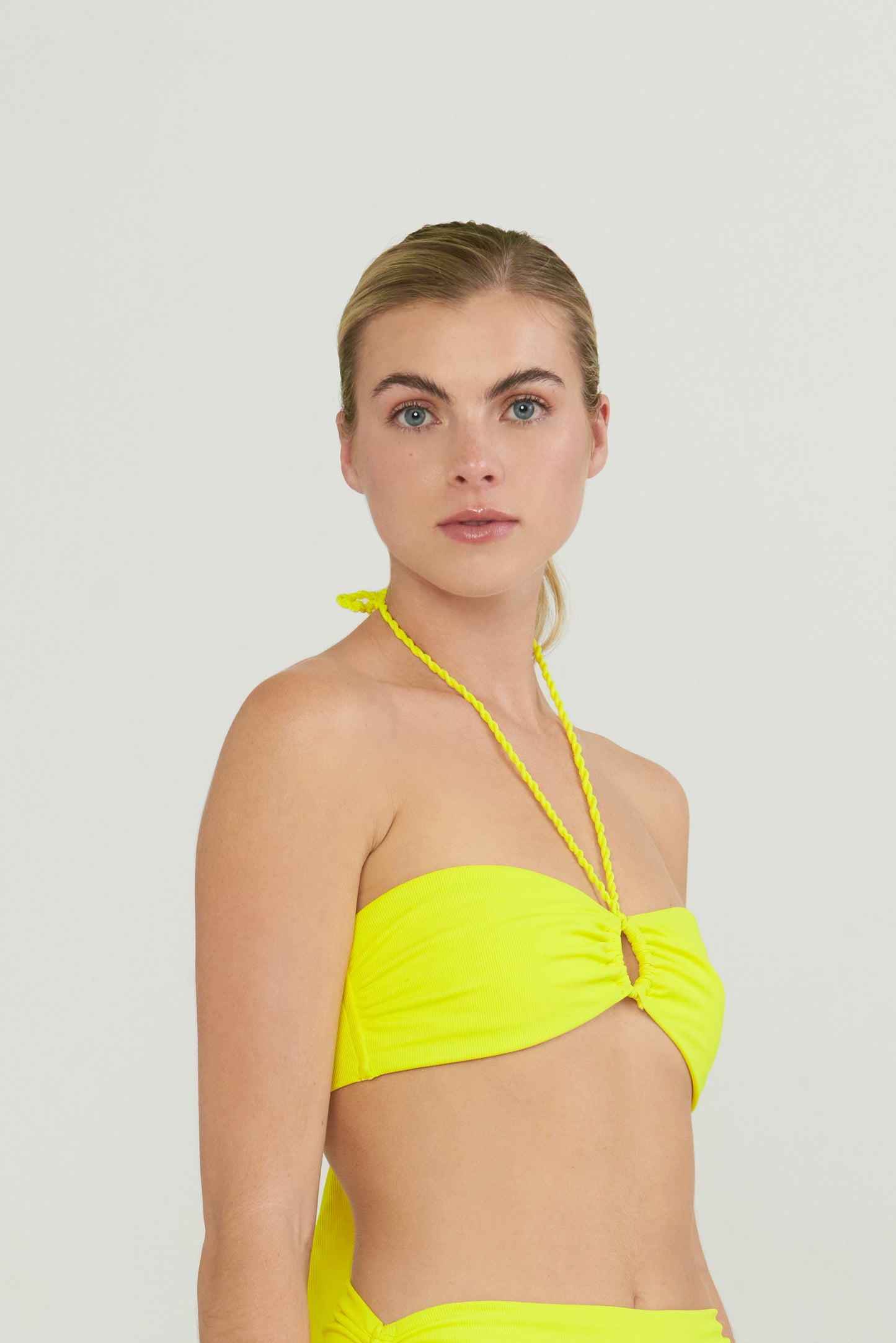 
                  
                    yellow ribbed bandeau style bikini top
                  
                