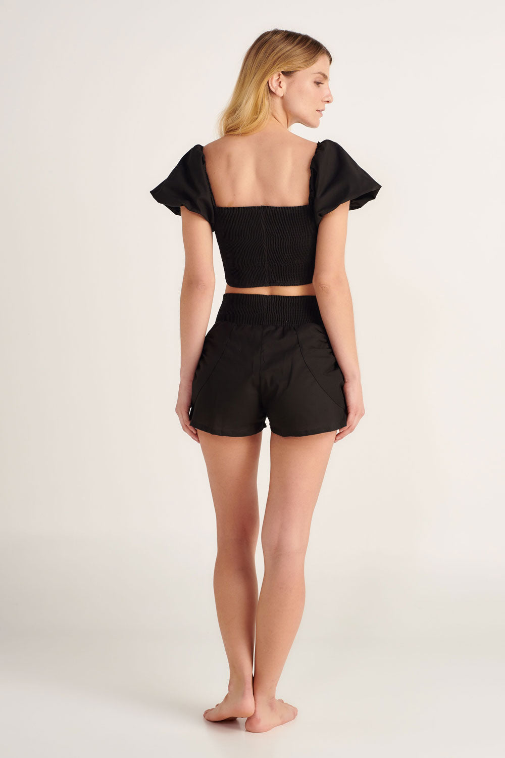 
                  
                    black puff sleeve crop top with matching shorts
                  
                