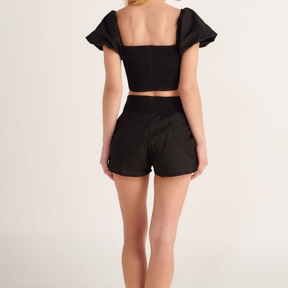 black puff sleeve crop top with matching shorts