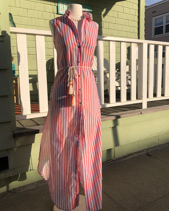 
                  
                    orange and purple striped button down dress on mannequin
                  
                